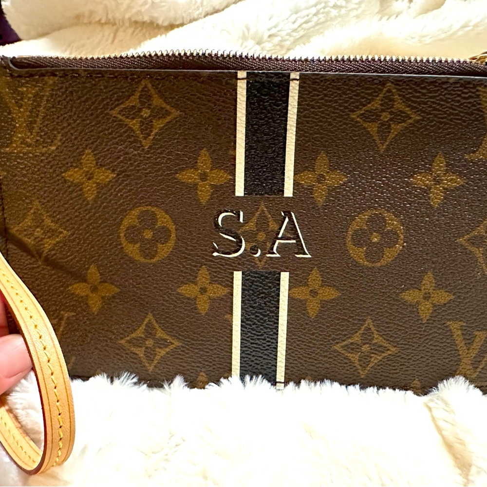 Authentic Louis Vuitton pouch/wristlet.